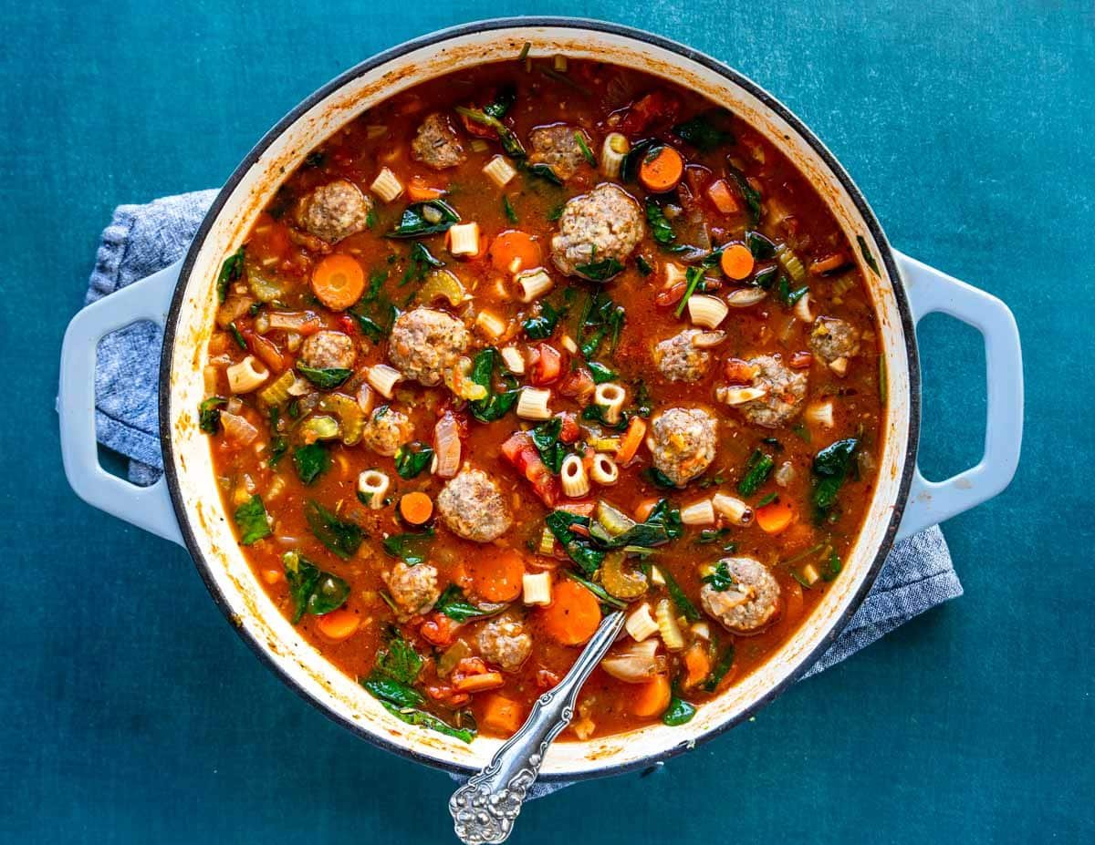 a large dutch oven full of Meatball Soup
