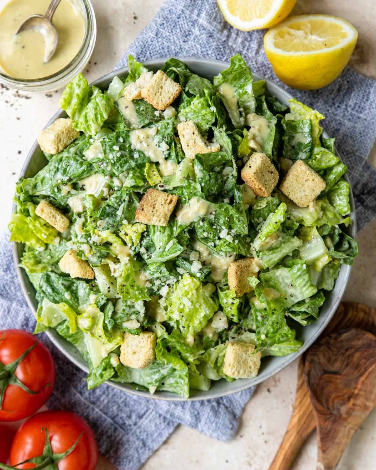 a large bowl of Caesar salad with an anchovy free salad dressing