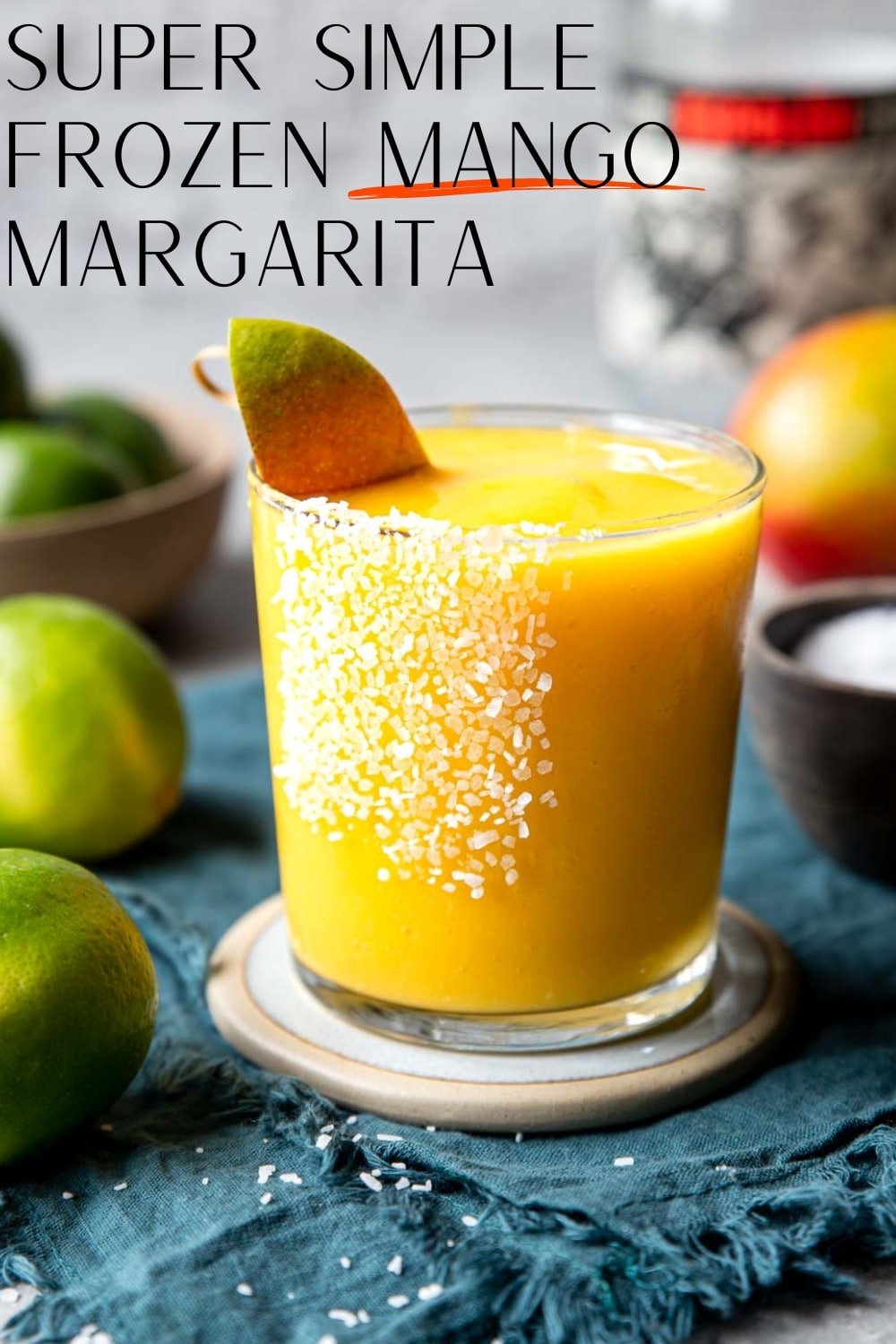 pinterest image for frozen mango margarita with text overlay