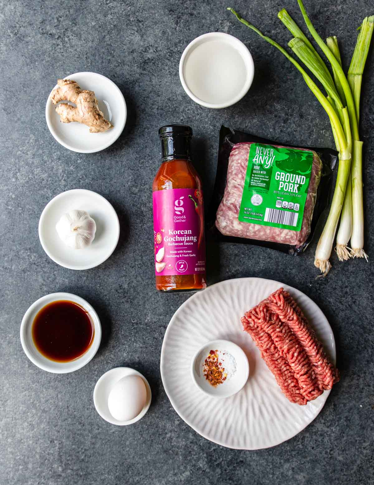 Ingredients on a table to make saucy gochujang meatballs