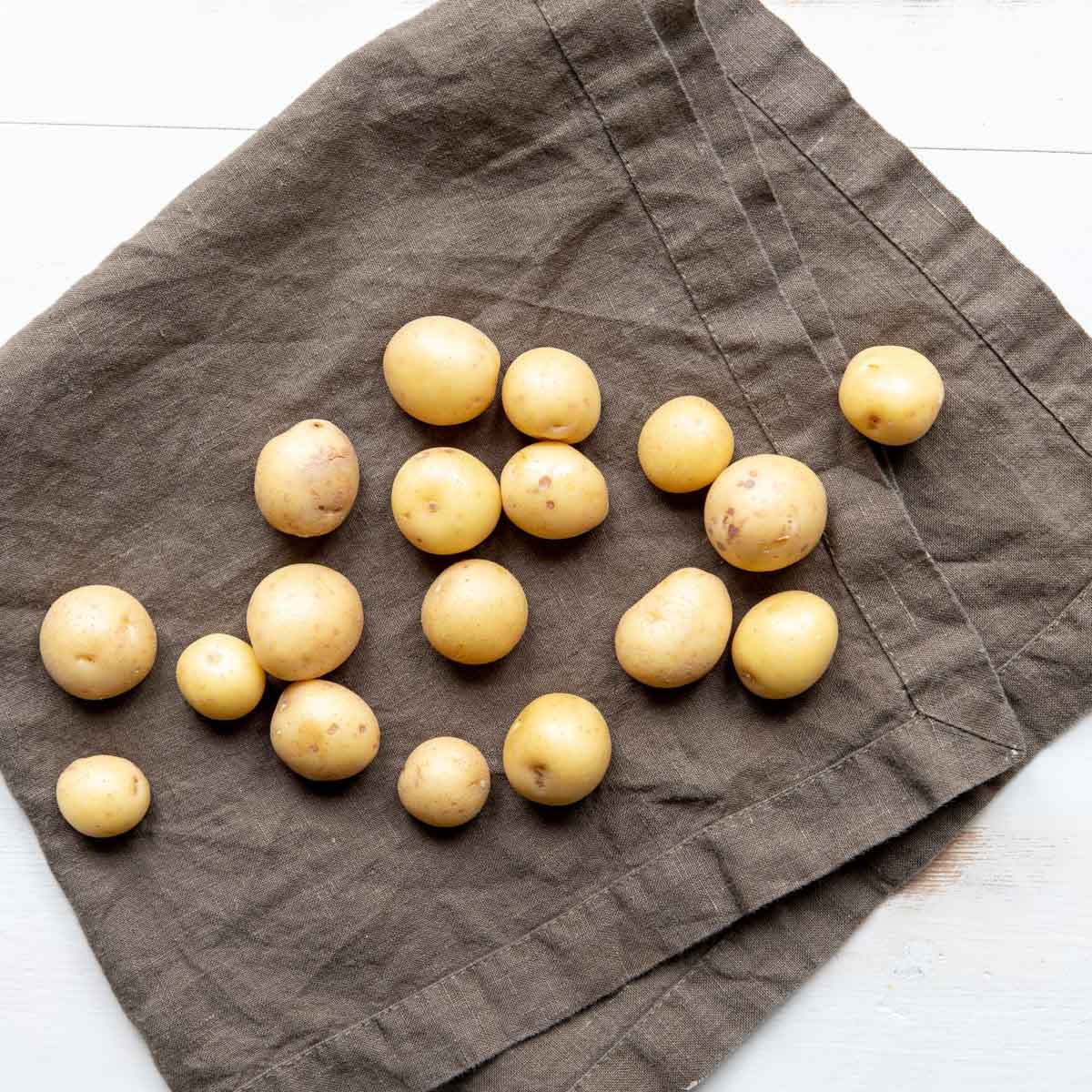 tiny Yukon gold potatoes on a napkin