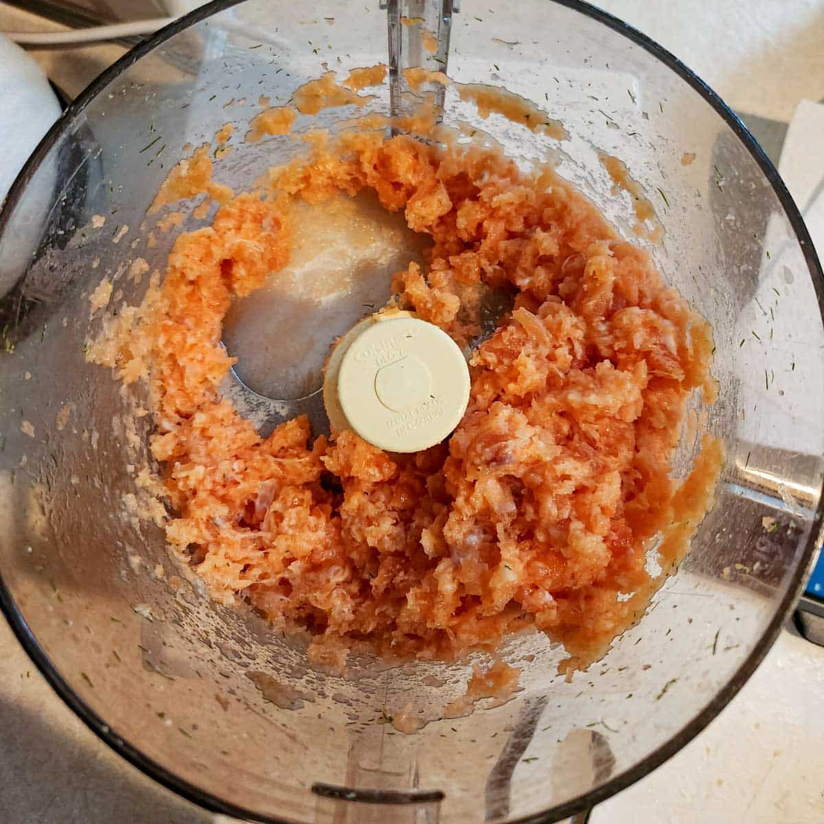 salmon mixed in a food processor for salmon burgers