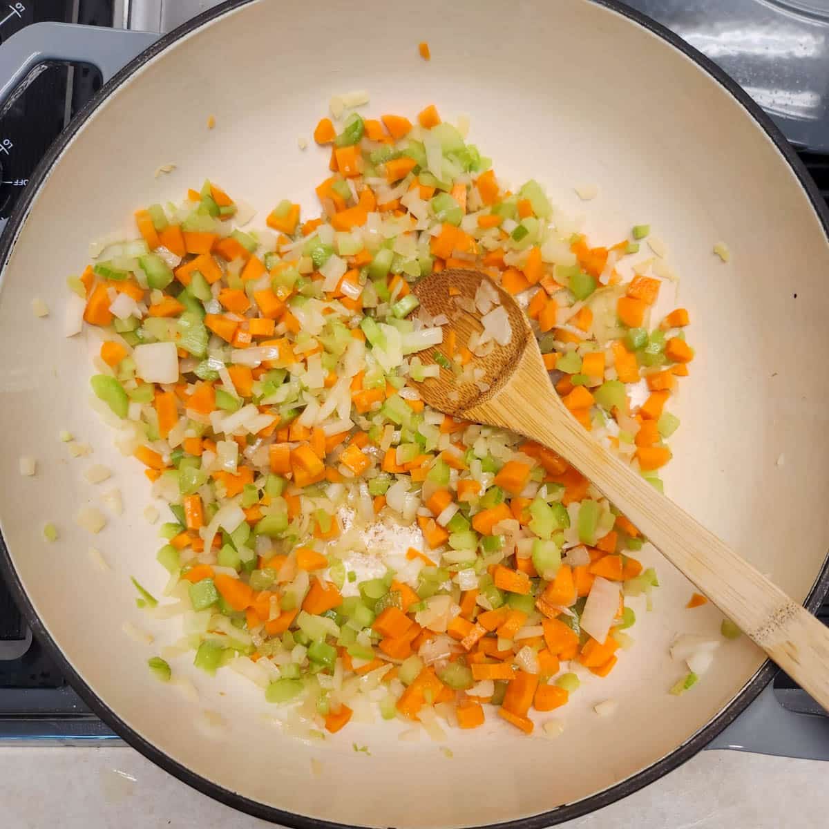 carrots, celery, onion in a dutch oven, sauteeing