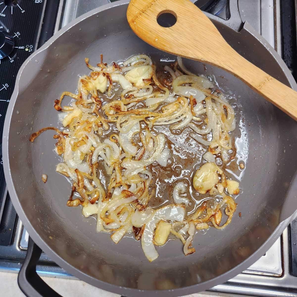 onions and garlic caramelized in a pan with butter
