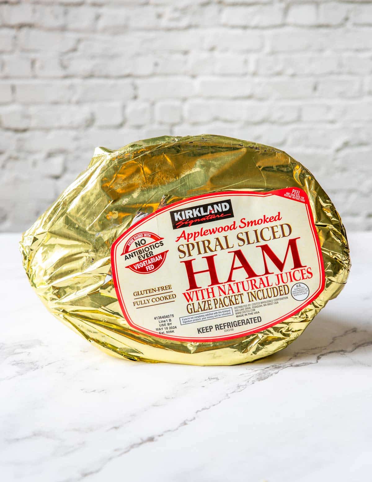 a gold foil wrapped spiral cut smoked ham from Costco