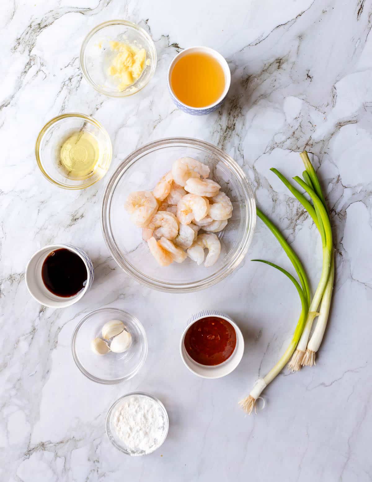ingredients for ginger garlic shrimp on a table 