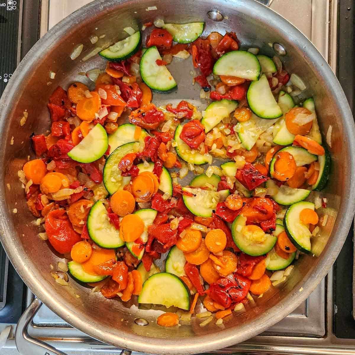 veggies sauteed in a skillet 
