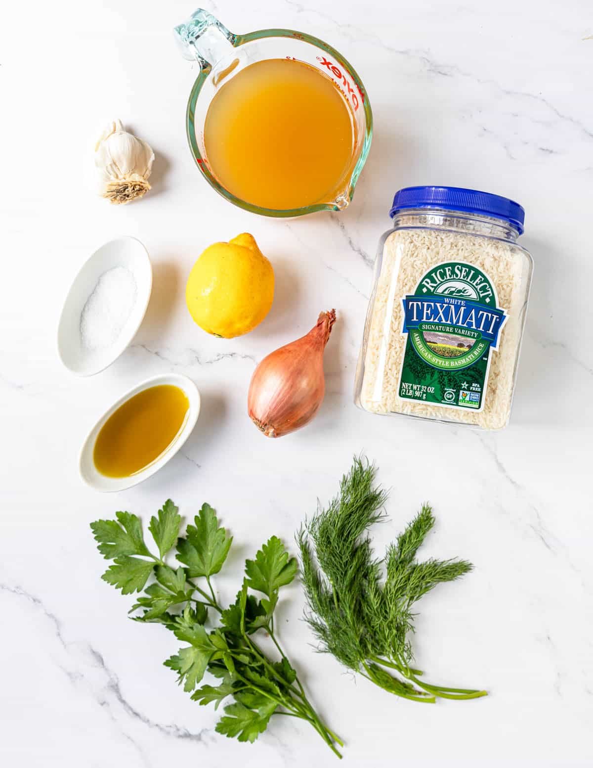 ingredients for lemon rice pilaf on a countertop