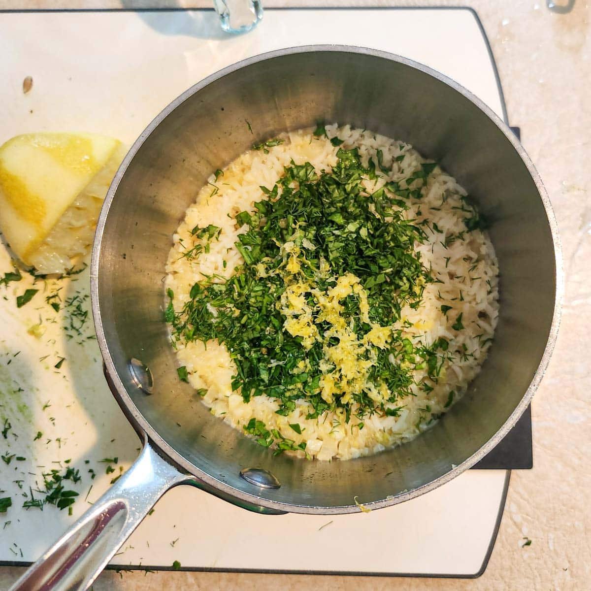 herbs on top of cooked basmati rice