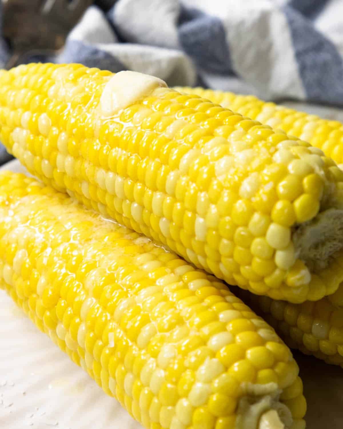 corn on the cob with a butter pat on top