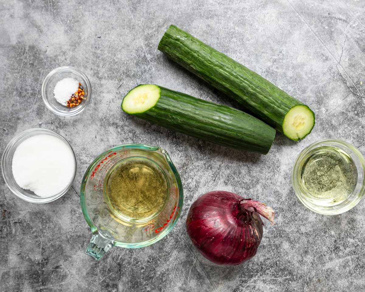 Ingredients for quick pickled cucumbers and onions 