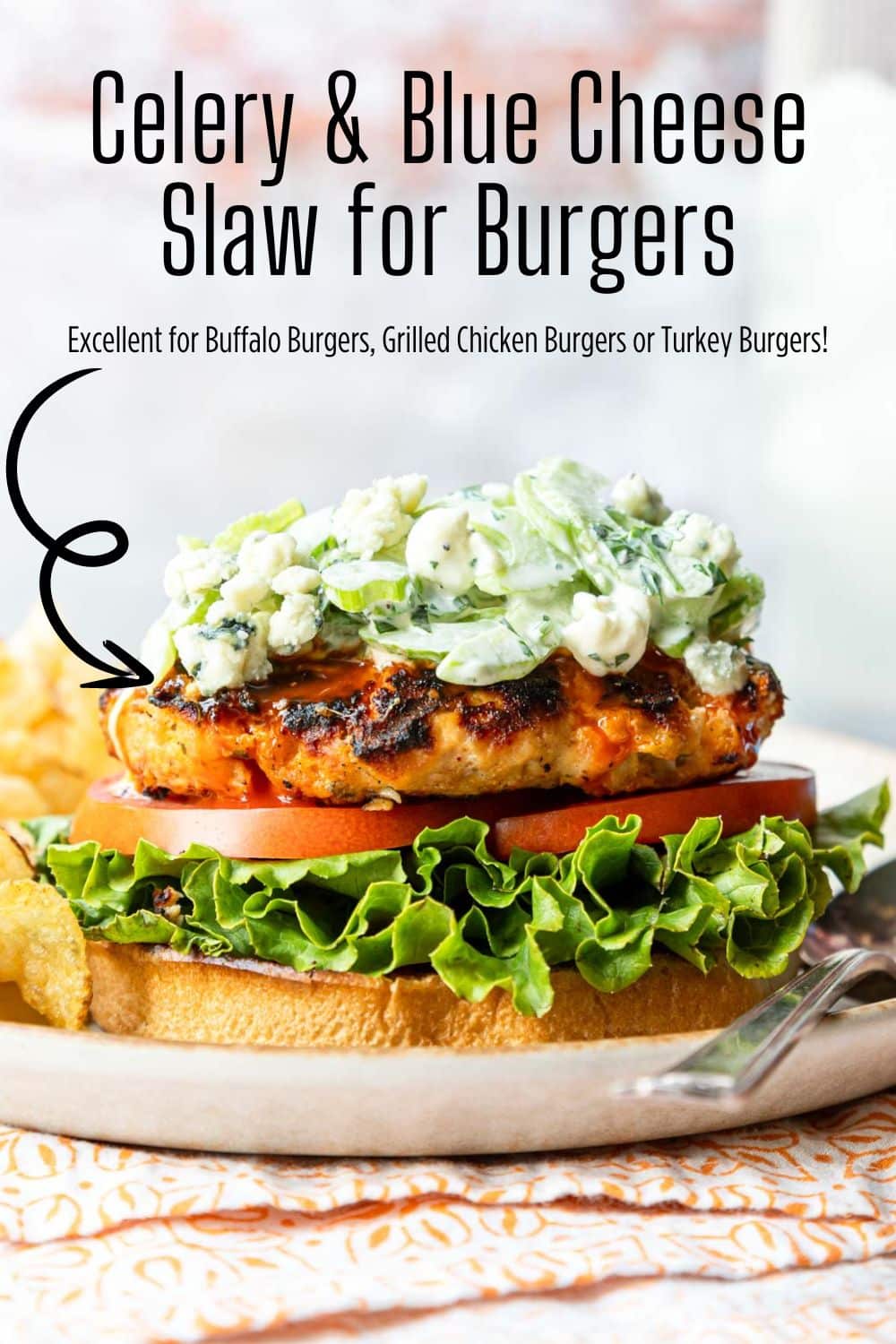 Pinterest pin for celery and blue cheese slaw topping a buffalo burger.