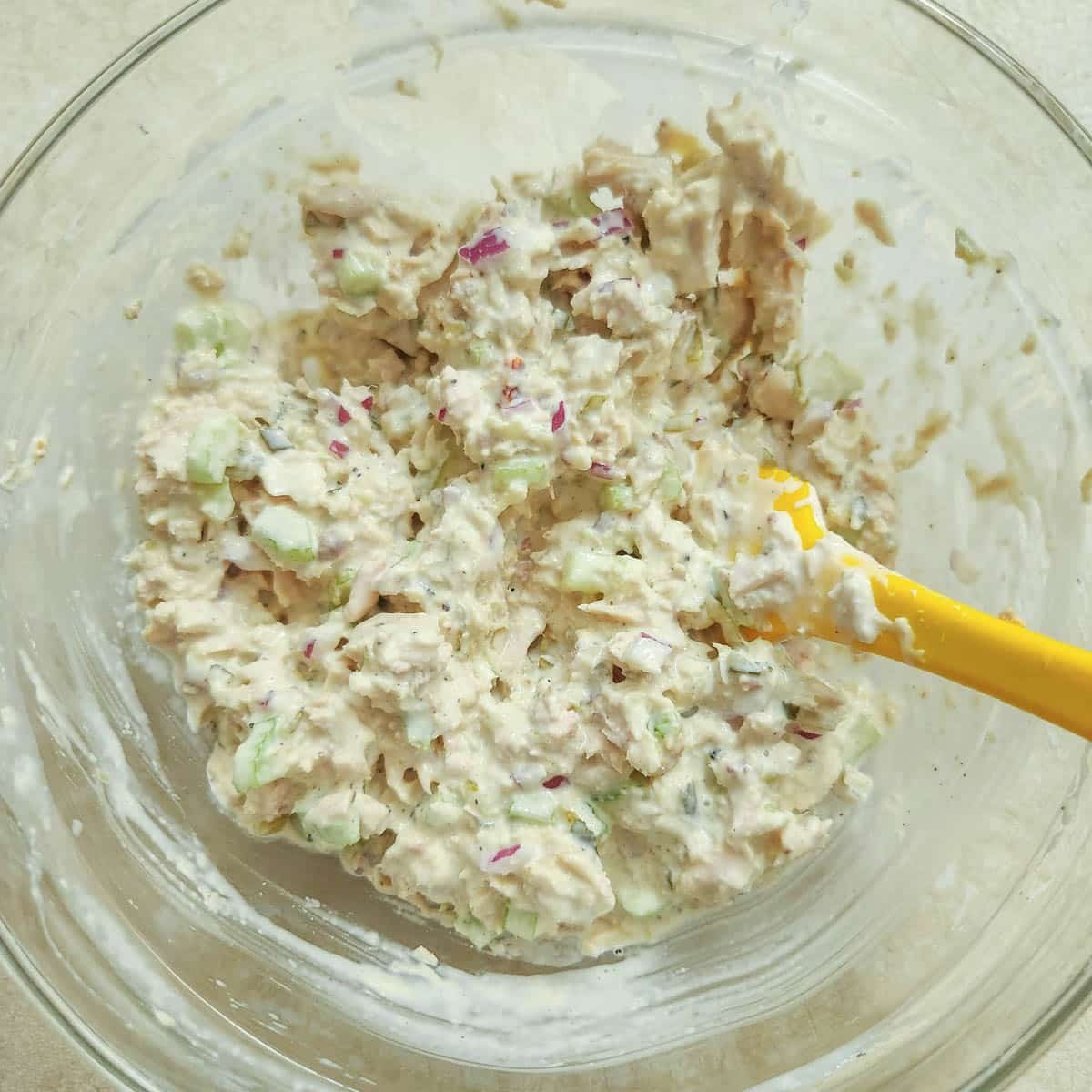 tuna salad mixed together in a bowl