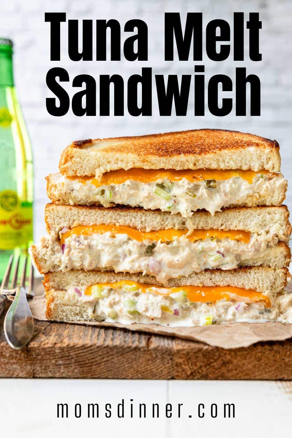 Tuna melt sandwiches piled on top of eachother, with text overlay for Pinterest