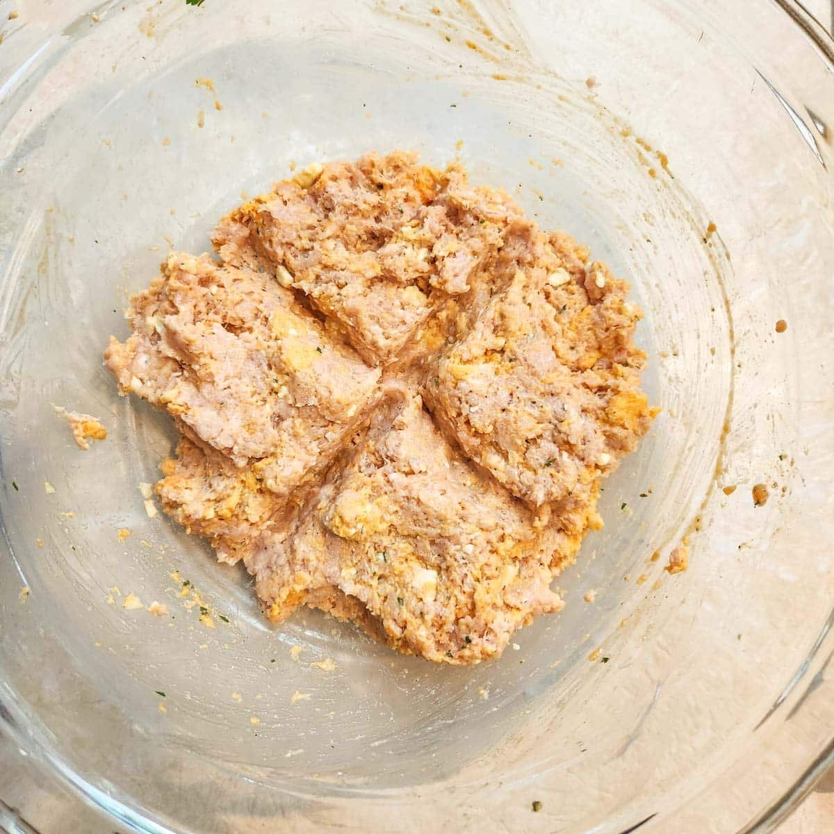 Buffalo burger mixture in a mixing bowl.