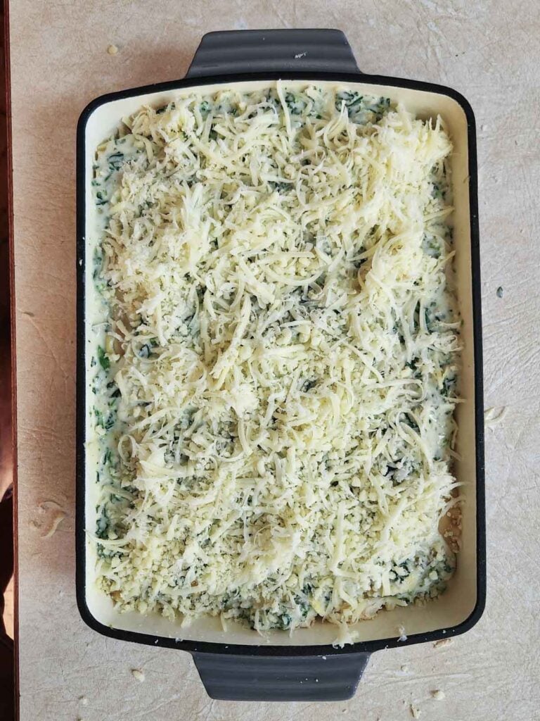 Chicken Lasagna layered in a 9x13 pan, ready for the oven.