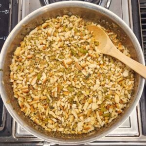 Stuffing mix added to the onion mixture in the skillet.