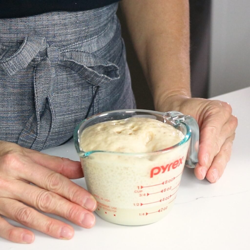 yeast that has bloomed in a 1 cup glass measuring cup