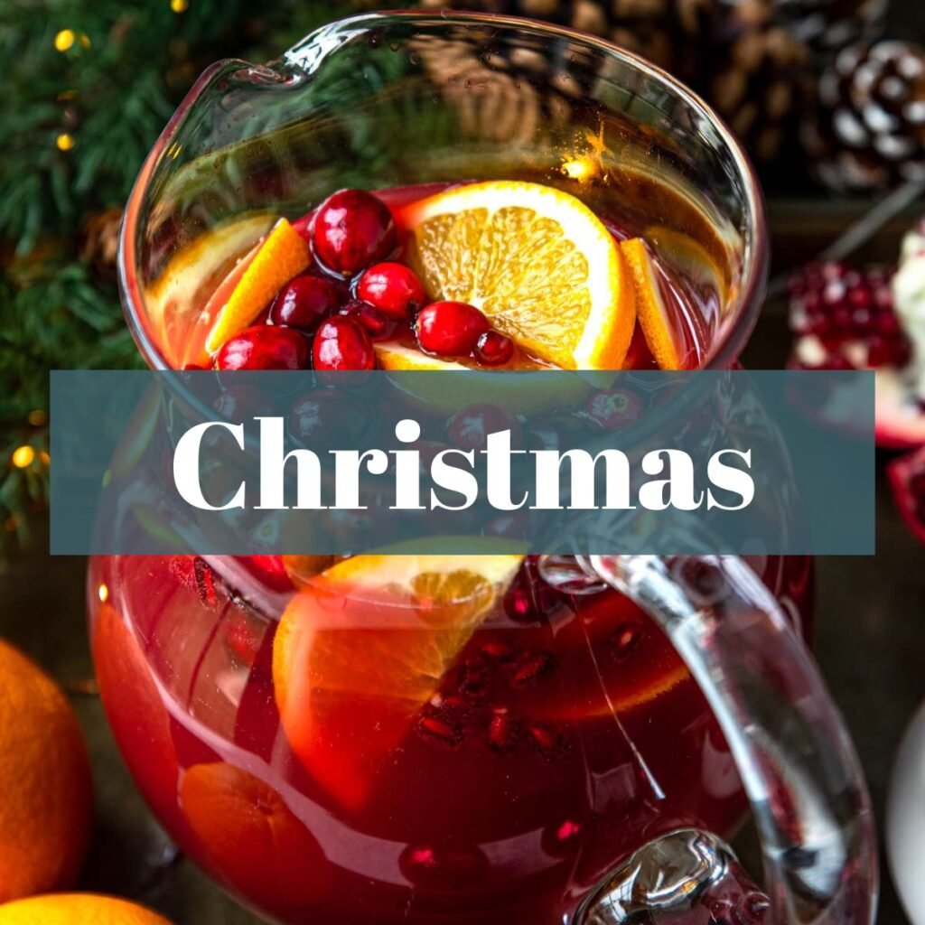 Christmas Punch in a pitcher with the Christmas over top