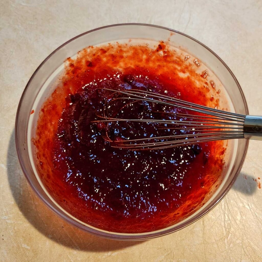 whisking cranberry jello salad 