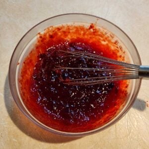 whisking cranberry jello salad