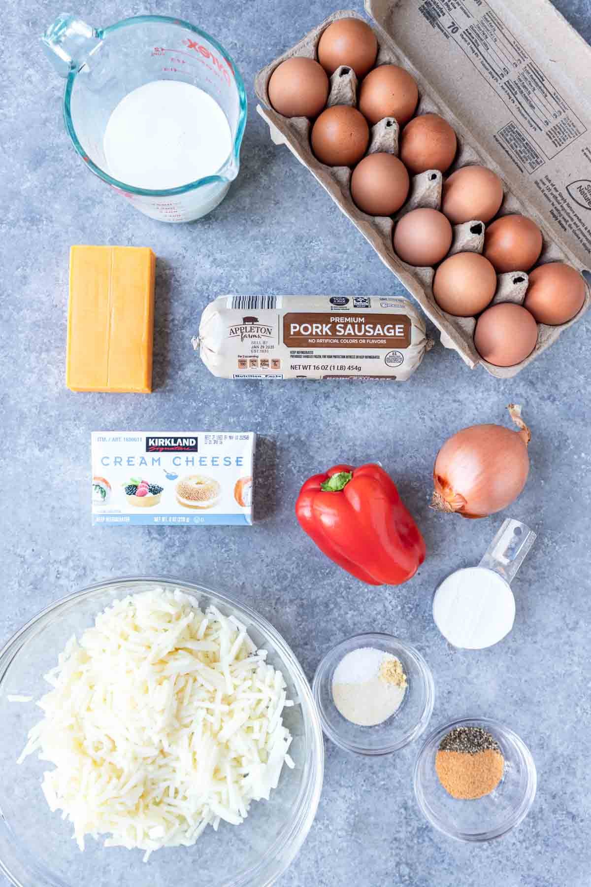 Ingredients shown are used to prepare sausage breakfast casserole.