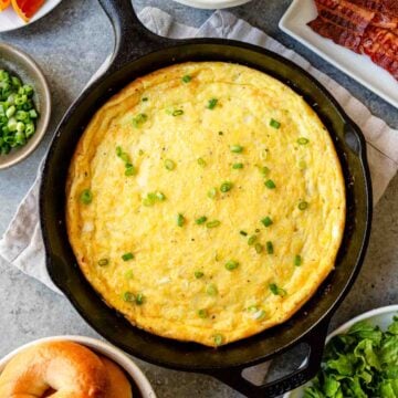 Egg frittata baked in a cast iron pan.