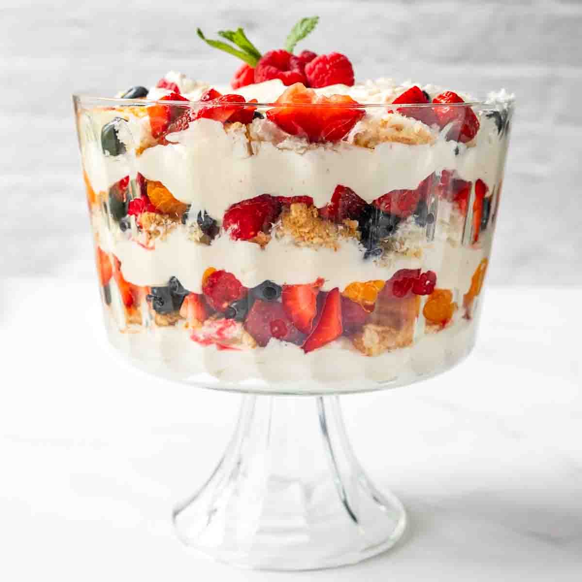 Finished Berry Cheesecake Trifle with garnishes on top