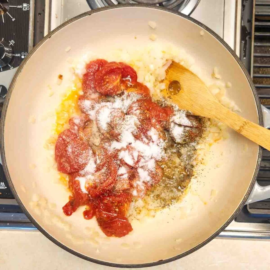 Seasonings added to the roasted tomato mixture.
