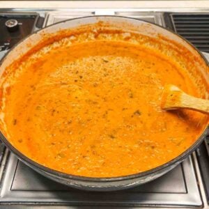 Cream added to the tomato mixture.