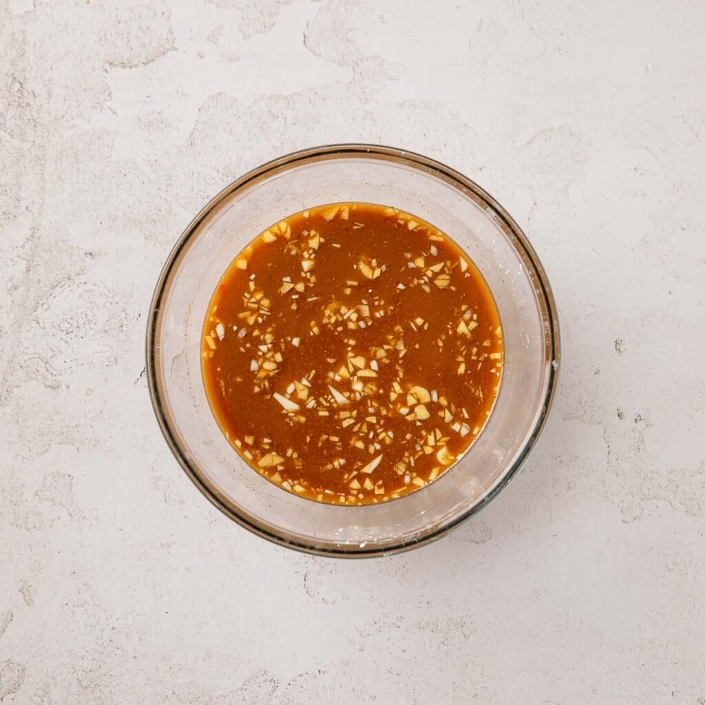 Pepper steak sauce in a small mixing bowl.