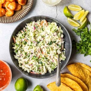 Creamy fish taco coleslaw served in a bowl.