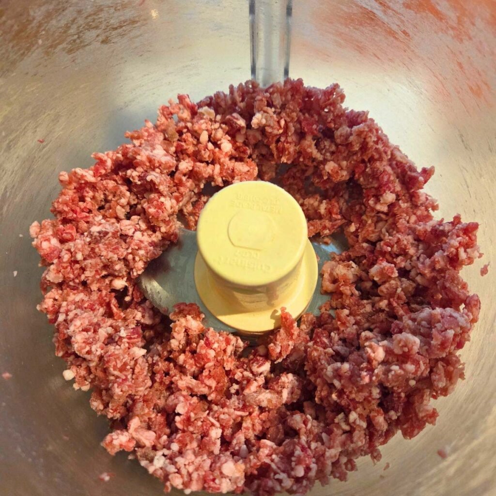 Ground ribeye in a food processor.