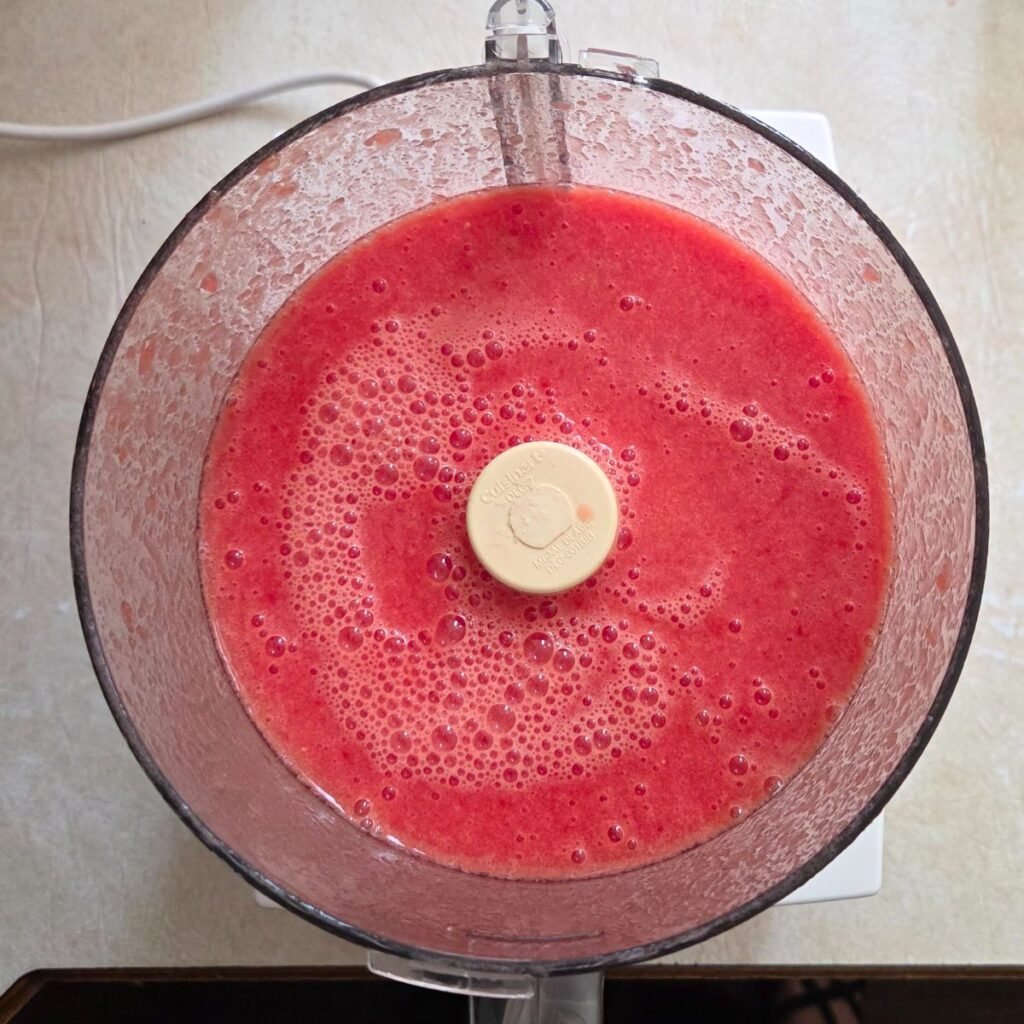 Gazpacho added to a food processor 