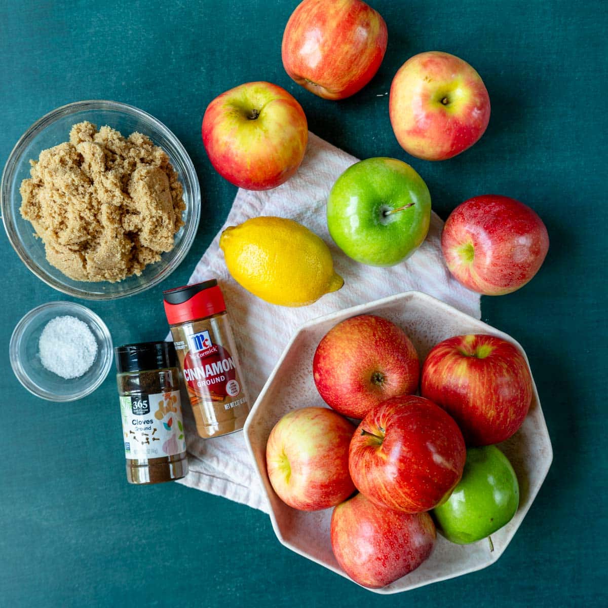 Ingredients shown are used to prepare homemade applesauce.