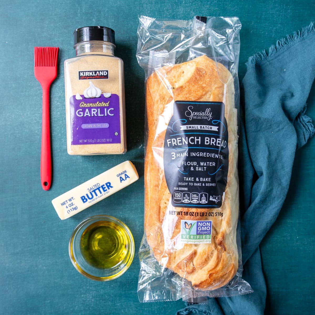 Ingredients shown are used to prepared easy garlic bread.