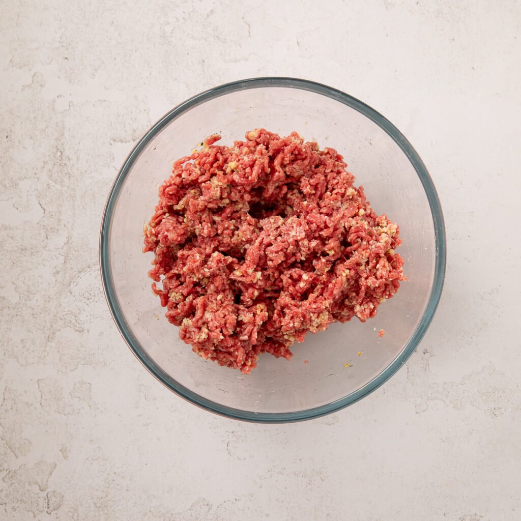 Ground beef and breadcrumbs combined.