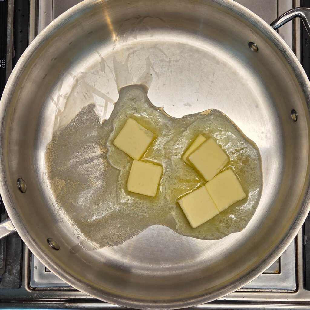 Butter melting in a saucepan.