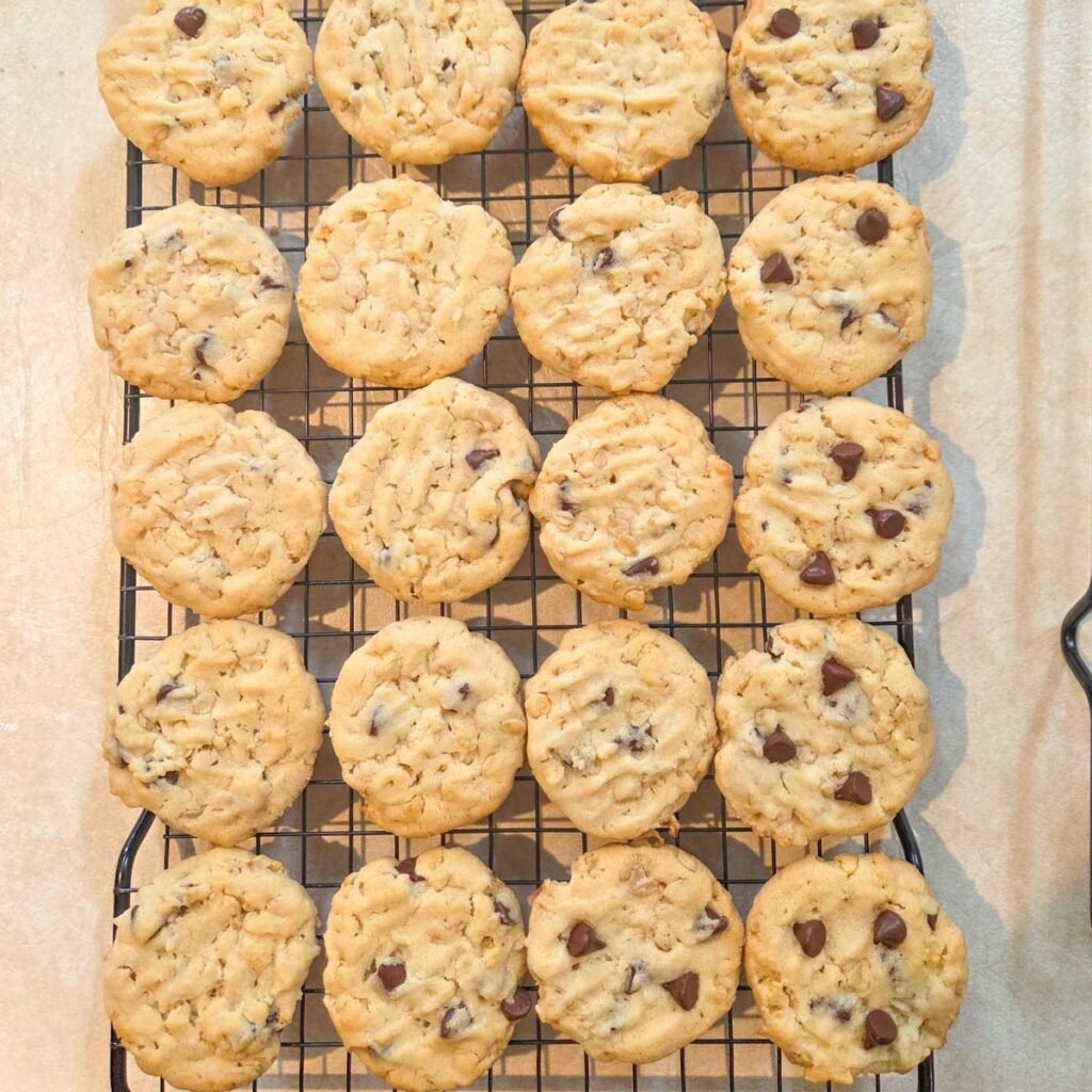 Top view of golden baked 100 Good Cookies on a cooling wrack.
