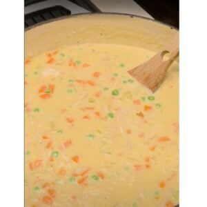 making chicken and biscuit filling on the stove top