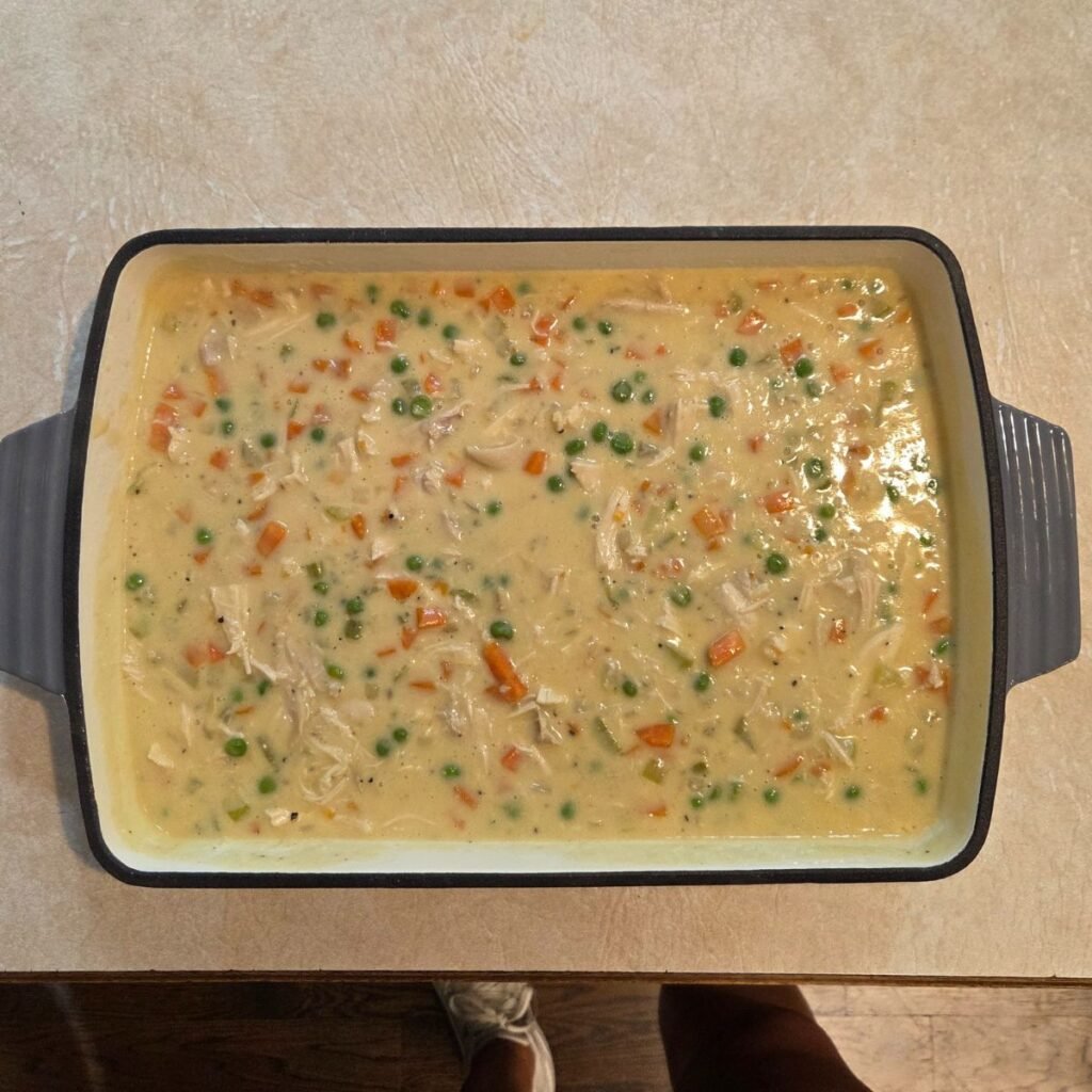 chicken and biscuit filling in a 9x13 pan