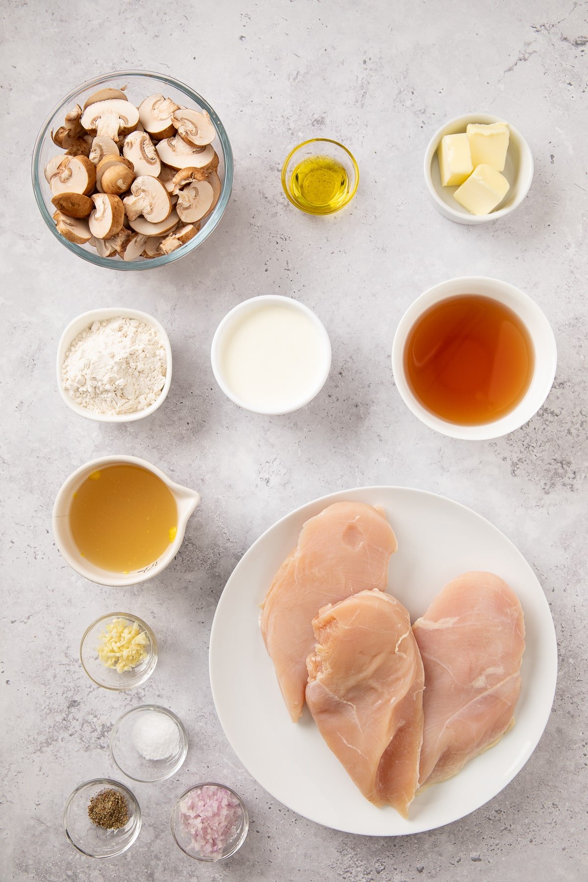 Ingredients shown are used to prepare chicken marsala.
