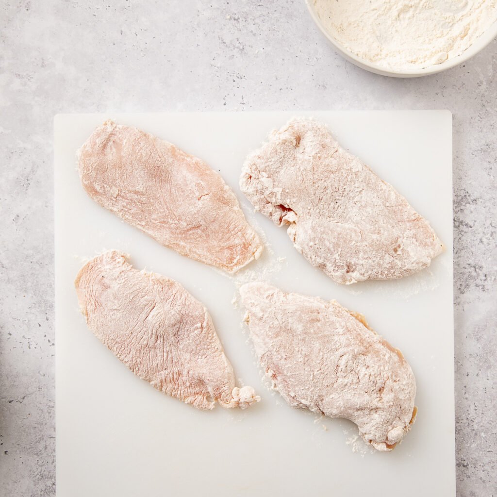 Flour coated thin sliced chicken breats.