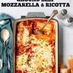 Pinterest image of beef manicotti in a baking dish.