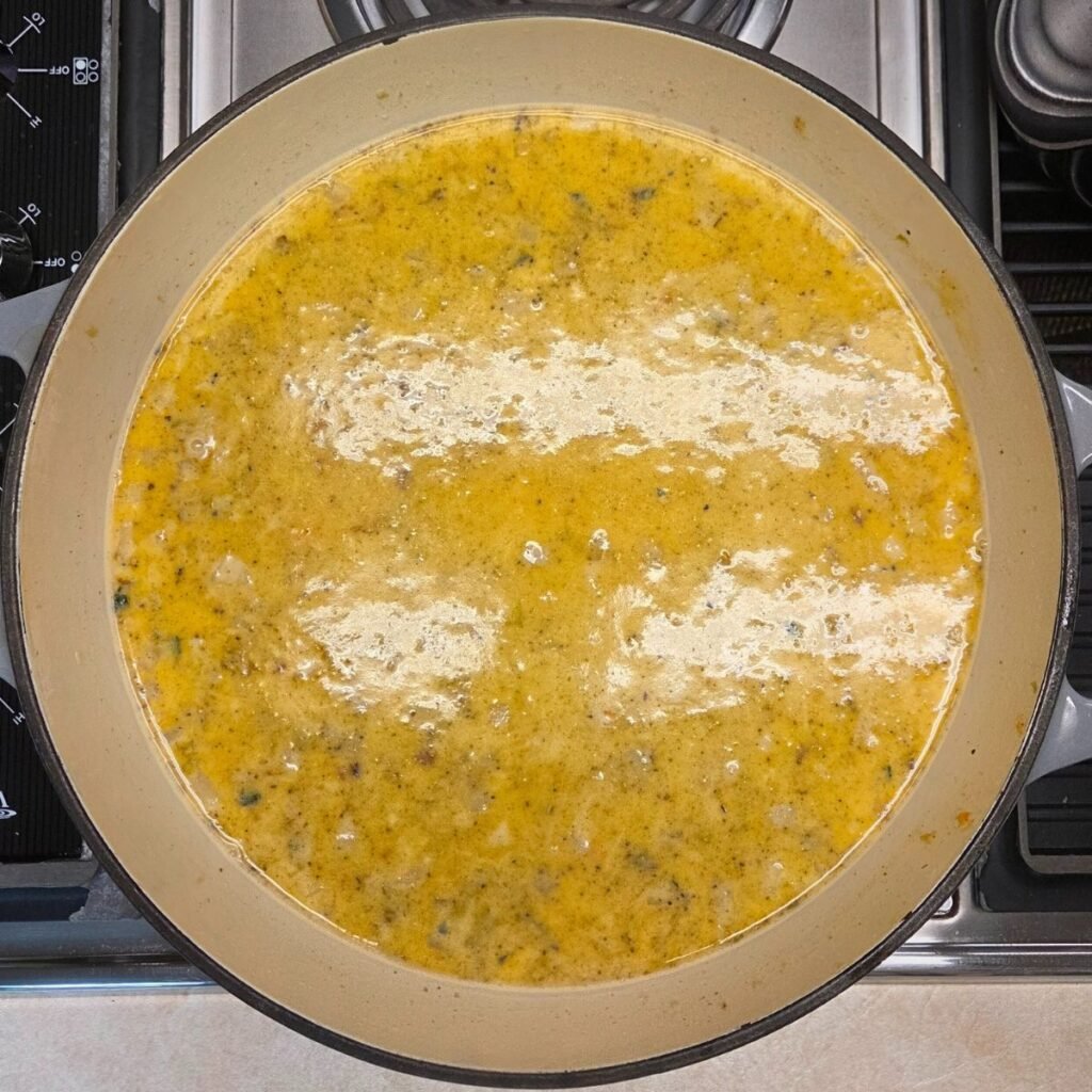 Chicken broth added to the veggie mixture.