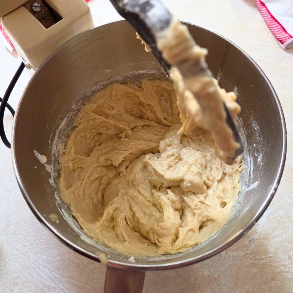 Banana bread batter in a mixing bowl.