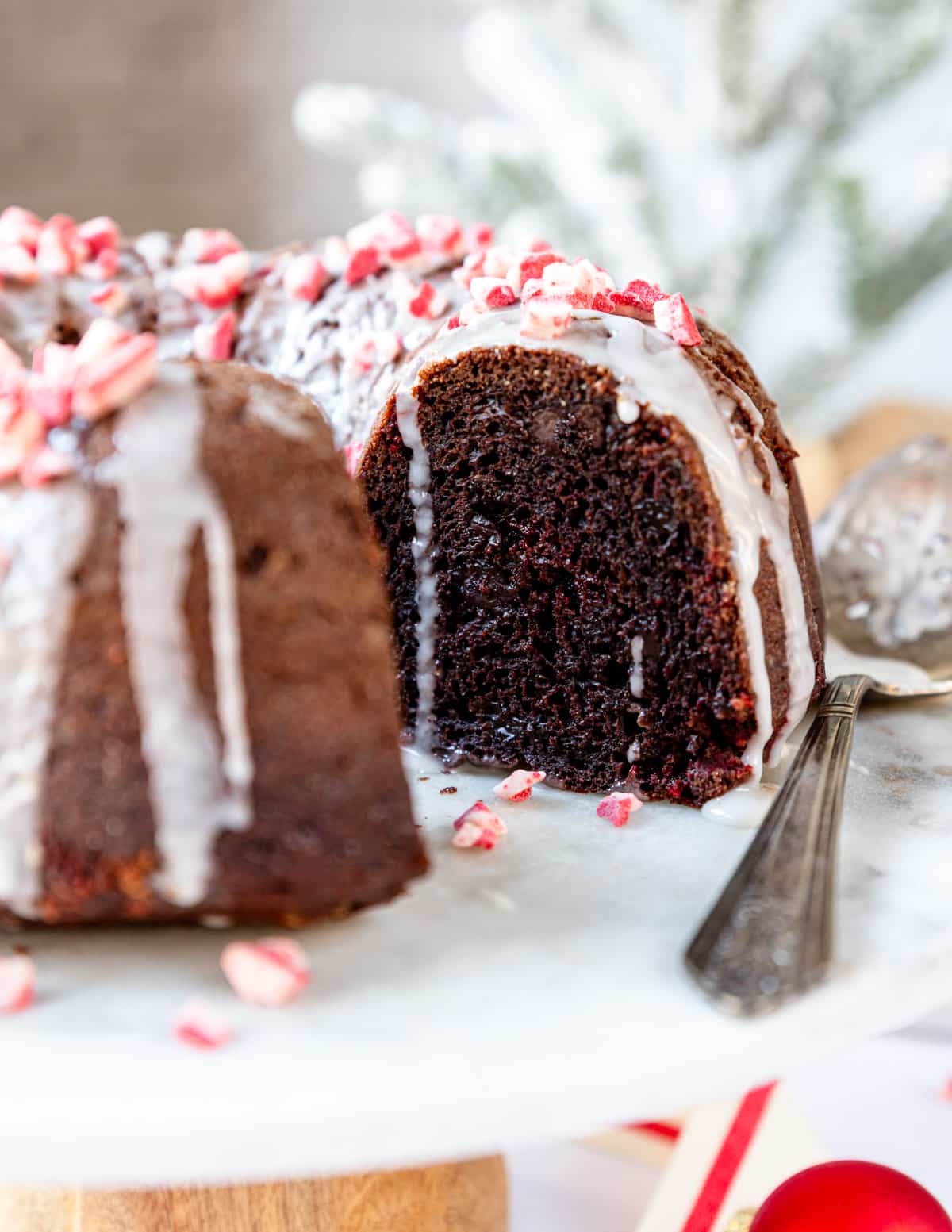 Slice removed from a chocolate peppermint bundt cake.