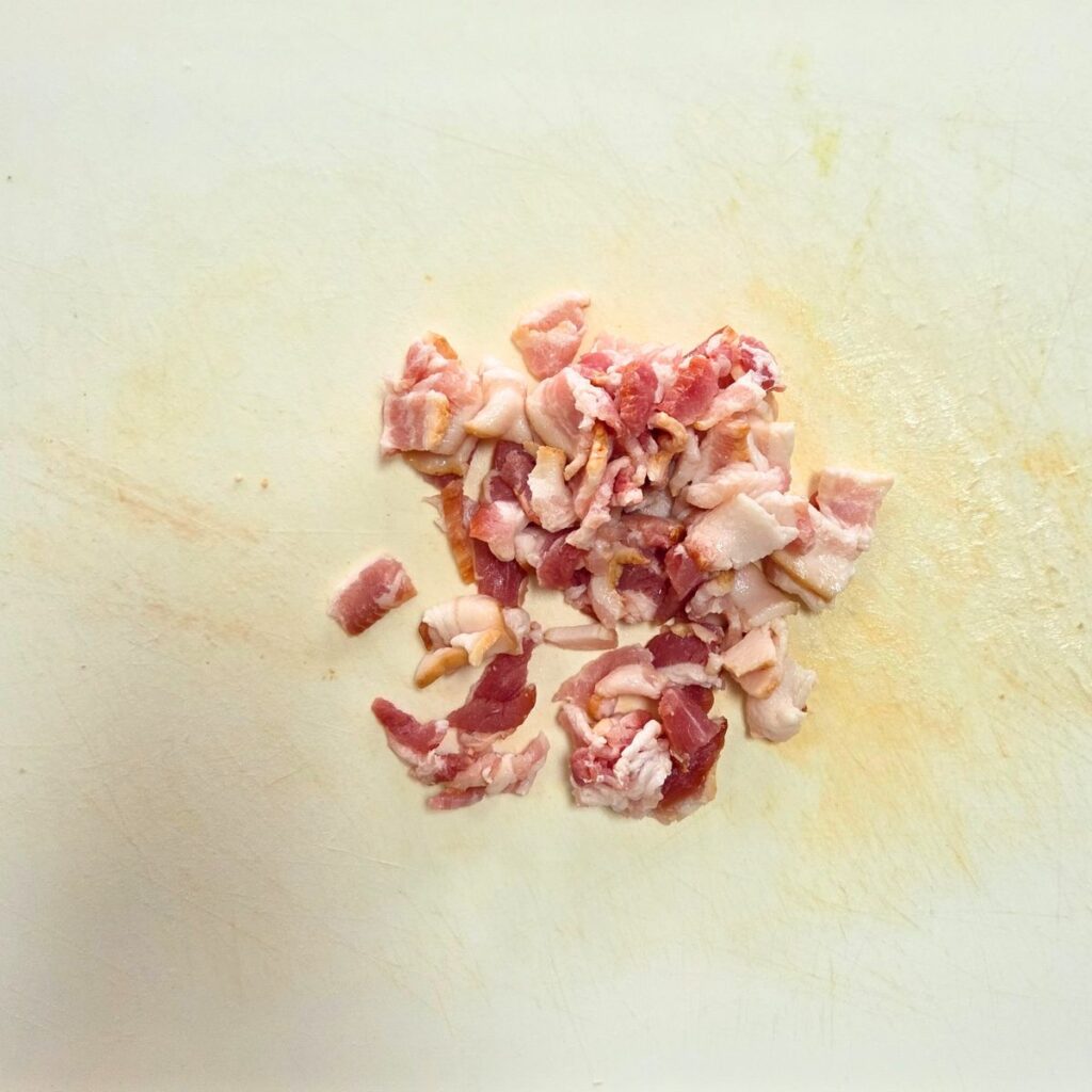 bacon chopped on a cutting board