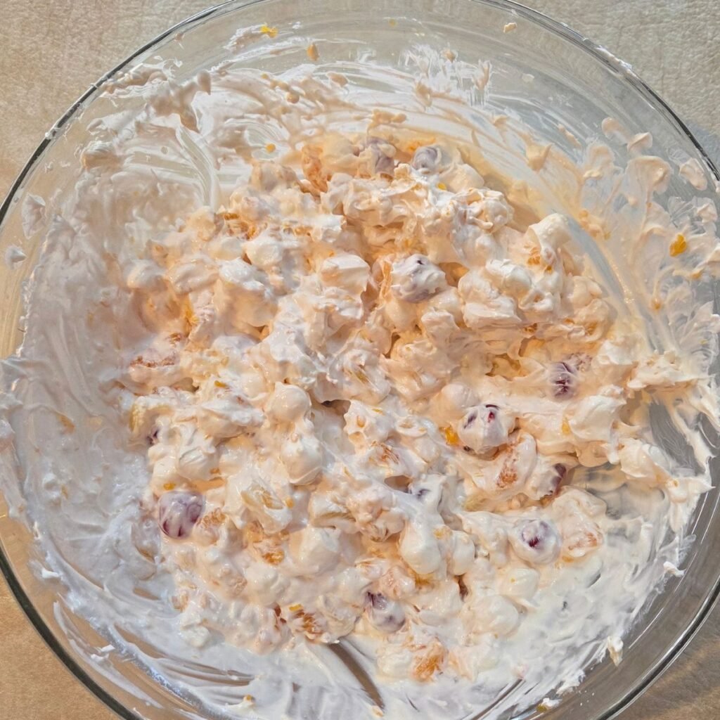 Ambrosia ingredients combined with the whipped cream mixture.