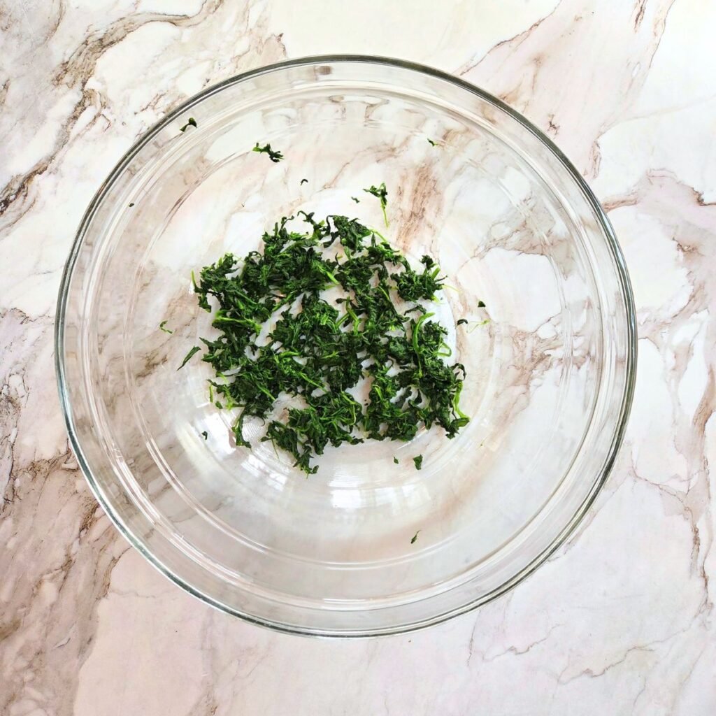 Frozen chopped spinach that has been thawed and squeezed of liquid